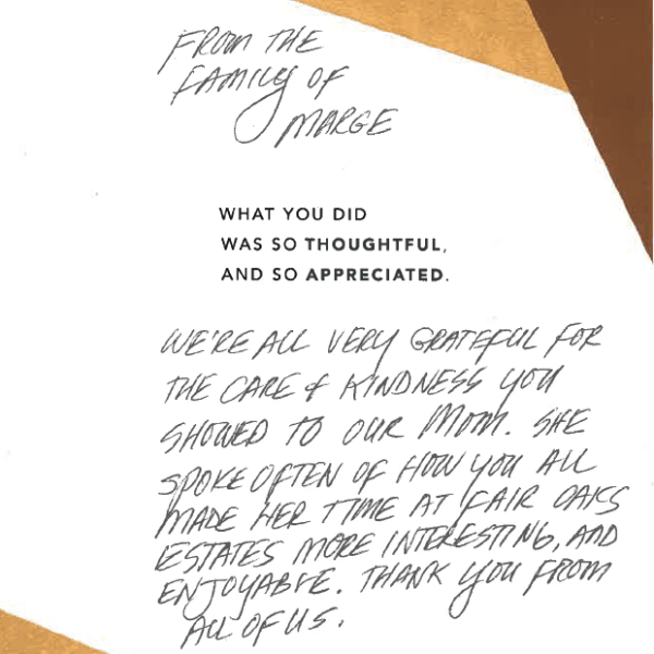 A thank you card with a handwritten note.
